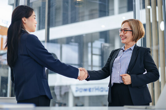 Business Women Handshake in Office Setting Professional Agreemen