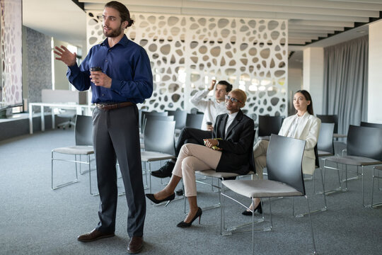 Young manager talking during video call conference in office