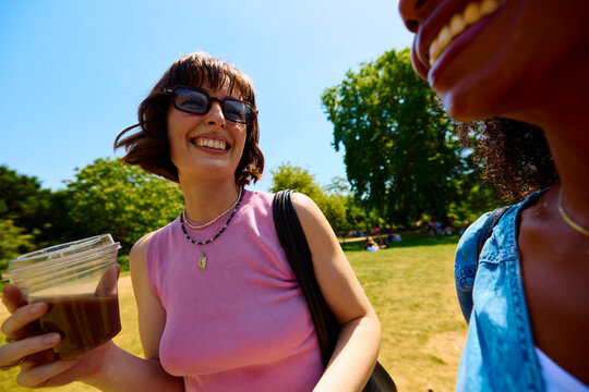 Friends spend time together in a park