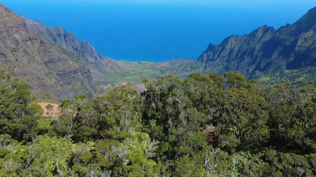 Overlook of a beautiful hidden valley and the famous Na Pali Coastline of Kauai, Hawaii