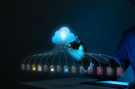Business professional managing secure cloud storage with digital files. Executive accessing encrypted data on futuristic holographic interface for...
