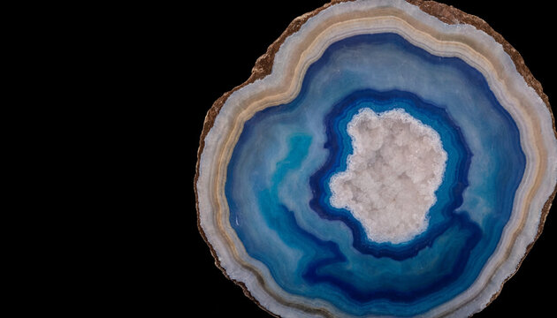 Polished blue and white agate stone slice with concentric patterns cross section gemstone polished crystalline specimen precious decorative collectible material semiprecious artistic