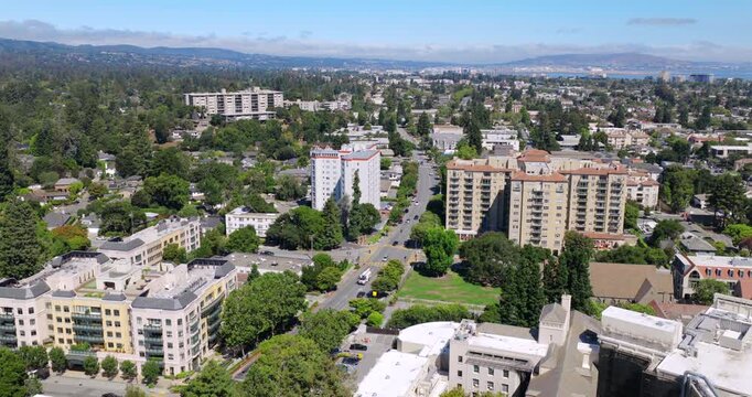 San Mateo - Aerial Approach Over El Camino Real Buldings and Apartments near Downtown on Summer Day