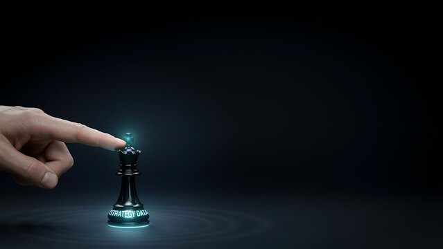 Human finger touching glowing king chess piece symbolizing strategic data management decisions