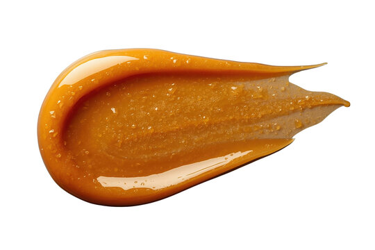 Caramel sauce swath showing rich brown color, sweet liquid texture, and glossy finish, perfect for dessert toppings