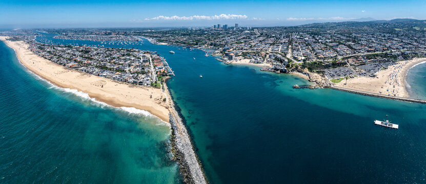 panoramic aerial landscape overview of Newport Beach cityscape with Balboa Beach, Balboa Island and Corona del Mar State Beach located California, 