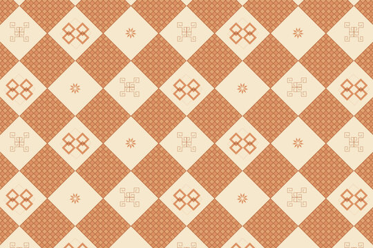 Small folk motifs fill an orange diamond quilt grid on soft cream for a warm decorative look. Ideal for fabric and packaging.