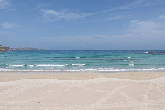 Malpica beach ocean waves breaking on sand