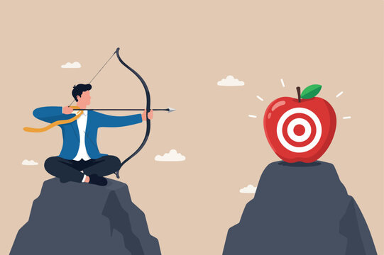 Concentration and focus on business goal or target, business plan for winning strategy concept, businessman archery holding arrow and bow meditate and focus on bullseye target at the center of apple