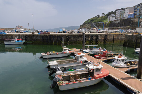 Malpica fishing harbor with docks and moored boats