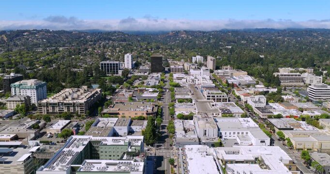San Mateo California - Aerial View of Downtown Facing West down 4th St with Homes in Hills and Fog in Distance During Daytime
