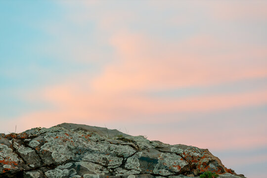 Empty Rock Podium Against the Evening Sky