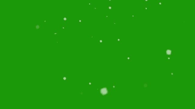 Falling snowflakes animation displaying winter weather patterns isolated on a vibrant green screen background for seamless chroma key compositing in professional video production workflows.