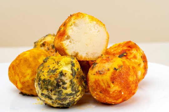 araffy bowl of cheese balls with herbs