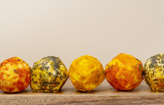 araffy bowl of cheese balls with herbs
