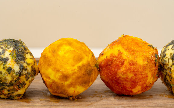araffy bowl of cheese balls with herbs
