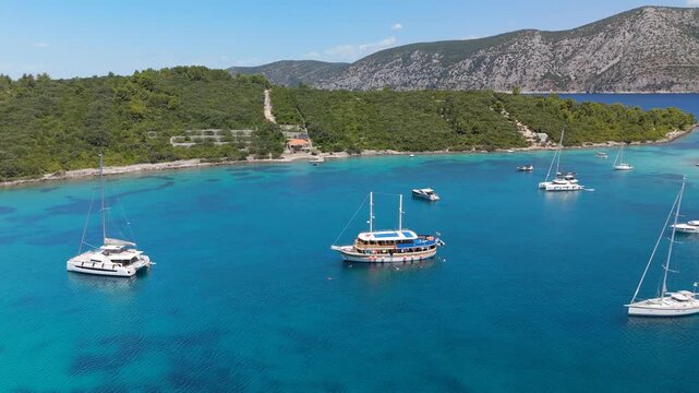 Aerial Cruise Boat Anchored Turquoise Bay Swimmers Korcula Island Croatia