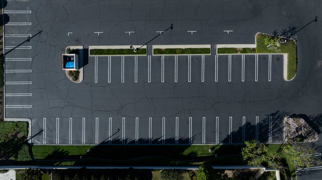 Aerial top down view of an empty parking lot.