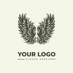 Fototapeta premium Elegant vintage style wing logo design with detailed feather texture and ornamental flourishes.