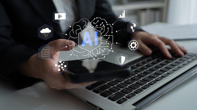 Person Using Smartphone with AI Graphics and Laptop in Modern Office Setting, Technology Concepts, Business Innovation and Digital Transformation Haptic.