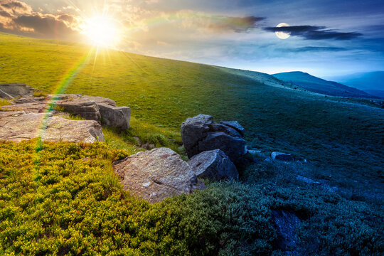 alpine meadow on summer solstice nature. day meet night. sun and moon in harmony over wild grass and grey rocks in carpathian landscape. mountain scenery for astrology wallpaper