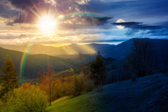 day meet night. mountainous countryside scenery. epic sky view above the valley. sun and moon over green fields and trees on the hills. nature scenery of carpathian mountains. harmony concept