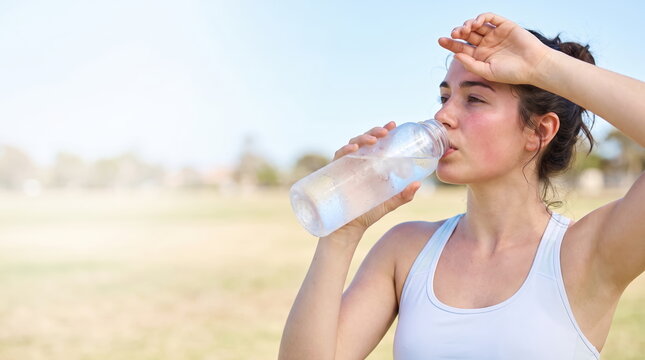 Woman Refreshing Her Face with Cold Water for a Cool and Invigorating Experience