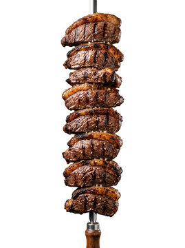 Picanha steak slices stacked on a metal skewer with grill marks and salt PNG Isolated on transparent background