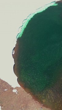 High Altitude Aerial View of Alpine Crater Lake in Extinct Volcanic Mountain Range