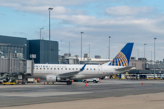 Dulles Airport, Virginia, USA - January 8, 2024 - Close up of United Express regional jet, registration N640RW, parked at the gate at Terminal C of Washington Dulles International Airport
