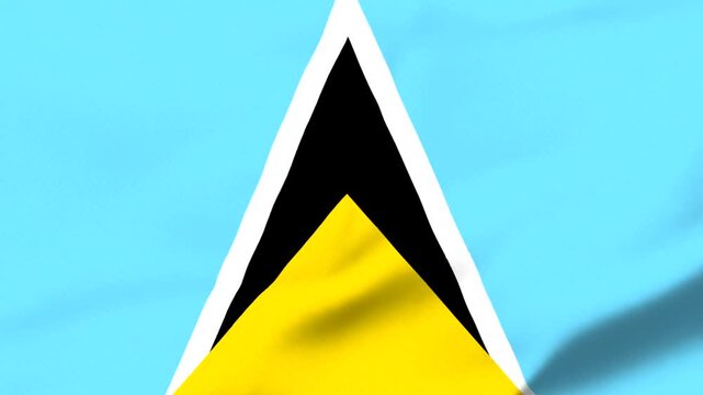 Closeup view of Saint Lucia national flag waving in wind