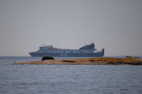 DFDS Seaways Passenger Ferry Sailing Near Rocky Shoreline Of Boon Island Sweden