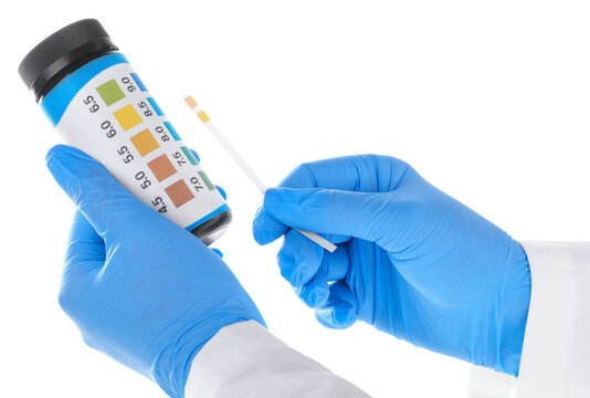 Laboratory worker with PH test strip and container on white background, closeup