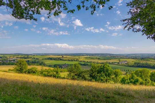 Summer landscape, The terrain of hilly countryside, A hamlet on hillside with greengrass meadow and trees, Eys is a village in the municipality of Gulpen-Wittem and region in Zuid-Limburg, Netherlands