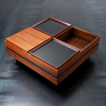 Vintage low table, made of veneered wood with modular storage compartments and black laminate lids.