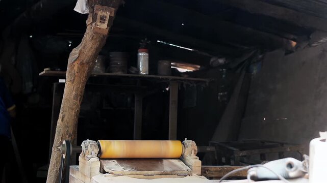 Sawdust Particles Floating in Sunbeams Inside Old Woodworking Workshop - 4K