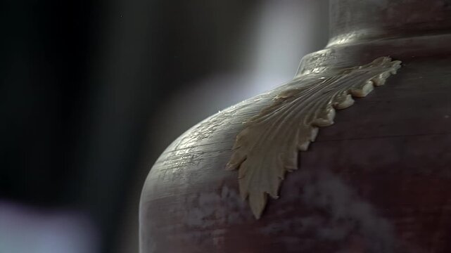 Macro Shot of Craftsman Placing Decorative Wax Leaf on Bell Mold - 4K