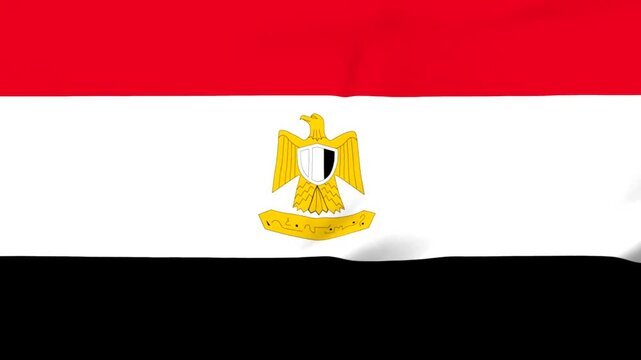 Egyptian flag with eagle emblem waving in the wind