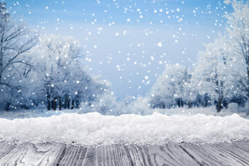 Fototapeta premium Snowy surface against trees, selective focus. Winter season