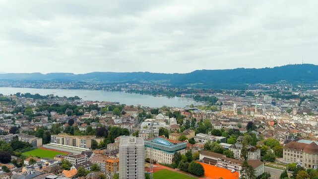 Zurich, Switzerland. Panorama of the city overlooking Lake Zurich. Summer day. Drone footage