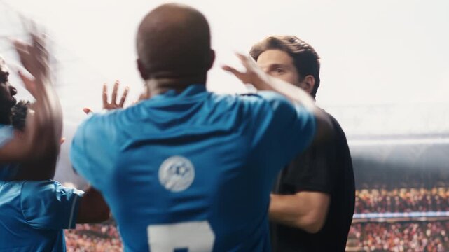 Referee blowing whistle and showing yellow card toward protesting player, sanctioning rules violation with warning during football match, disciplinary action in game, for football match content.