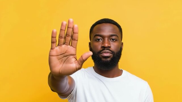 A man gesturing to stop