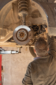 vehicle repair with welding and lift  by a specialized mechanic