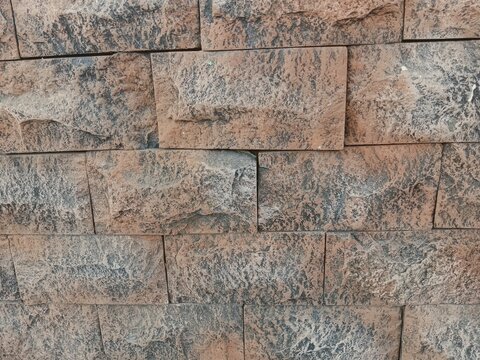 Rectangular stone wall texture relief, 3D background for rendering and materials, aesthetic and vintage wallpaper.