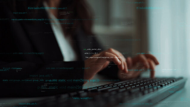 This image captures a programmer typing on a keyboard within a modern office setting, infused with dynamic digital elements representing coding and technology. Xenic