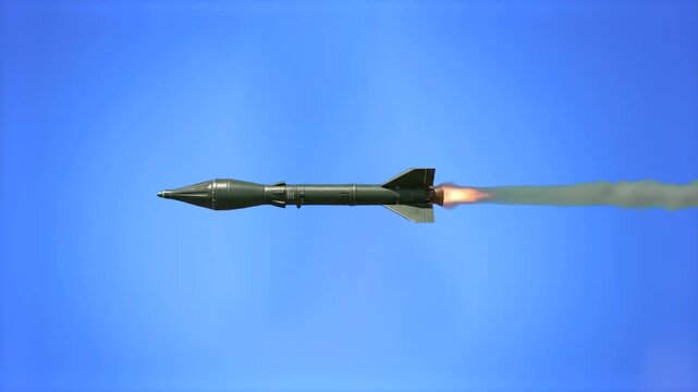A 3D model of a military rocket or guided missile propelled forward with active rocket engine fire and smoke, flying side profile view against a blue sky. Ideal for military, defense industry, weapon 