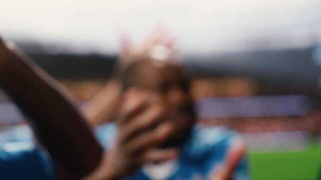 Close focus on red card shown by referee as foul punishment during football match, dramatic sanction due to rules violation and unsportsmanlike conduct.