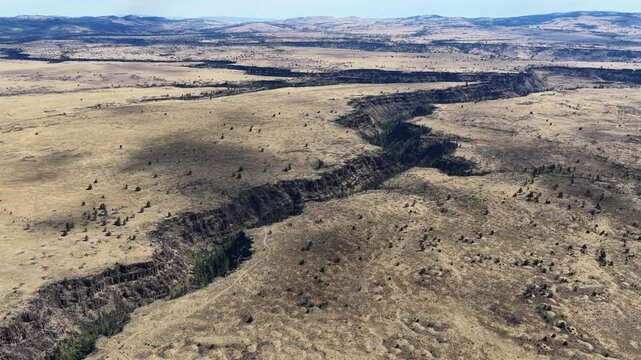 Over millennia Mill Creek has carved a 230-foot deep canyon on the Central Oregon plateau between Bend and Portland. This scenic area of high desert is part of the Warm Springs reservation.