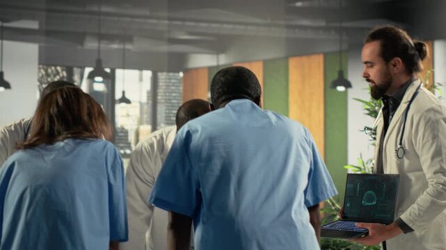 Doctors and nurses discuss therapy options inside a healthcare office, combining clinical information and treatment notes while they support care planning inside a medical team.