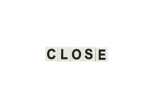Word close formed by letter tiles on a transparent background, representing termination, blocking, and closing